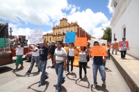 Domingo 22 de julio del 2012.. San Cristóbal de las Casas, Chiapas. Manifestantes del movimiento •132 realizan un mitin en la Plaza de la Paz para protestar posteriormente en las instalaciones de la Ex Maquiladora donde se construirá un nuevo Soriana en e