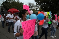 20230630. Tuxtla. Familiares y amigos de las 16 trabajadores de la SSyCP secuestradas marchan por las calles de la ciudad.