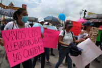 20230630. Tuxtla. Familiares y amigos de las 16 trabajadores de la SSyCP secuestradas marchan por las calles de la ciudad.