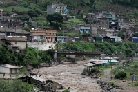 La comunidad Aguas Amargas es conocida por sus aguas sulfurosas y sus baños termales ubicados en las cercanías de Xelaju, Guatemala empiezan a regresar a sus actividades cotidianas después de las intensas lluvias de la semana pasada donde desaparecieran v