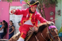 Viernes 19 de enero del 2018. Venustiano Carranza. Los Carrerantes de La San Bartolomé de los Llanos. Cabalgando y ataviados de rojo y cascabeles, los indí­genas recorren las calles entre las iglesias de San Sebastián y San Pedro durante la ví­spera de 