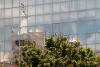 Miércoles 15 de julio del 2020. Tuxtla Gutiérrez. Aspecto del reflejo de la Catedral de San Marcos en los cristales del Edificio Plaza en el centro de la ciudad