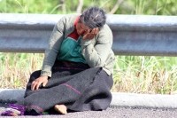 Viernes 21 de octubre del 2016. Tuxtla Gutiérrez. IndÃgenas del paraje Chamula de Cruztón esperan en la autopista hacia San Cristóbal a los representantes de la administración chiapaneca para exigir el cumplimiento de los compromisos de gobierno y la libe Viernes 21 de octubre del 2016. Tuxtla Gutiérrez. IndÃgenas del paraje Chamula de Cruztón esperan en la autopista hacia San Cristóbal a los representantes de la administración chiapaneca para exigir el cumplimiento de los compromisos de gobierno y la libe