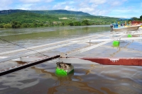 Lunes 6 de septiembre. Pobladores y turistas observan el aumentos del caudal del río Grijalva en el malecón y embarcadero de la ciudad de Chiapa de Corzo, a pesar de que no se cuenta con un informe real de CFE, el desfogue de las presas La Angostura y Chi