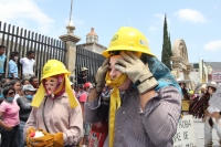 Lunes 7 de marzo. Los danzantes del Caranval Zoque coiteco recorren las calles de Ocosocuautla bailando y gritando dentro de la guerra de talco que caracteriza a esta fiesta de la depresión central del estado de Chiapas.