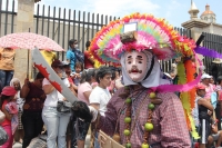 Lunes 7 de marzo. Los danzantes del Caranval Zoque coiteco recorren las calles de Ocosocuautla bailando y gritando dentro de la guerra de talco que caracteriza a esta fiesta de la depresión central del estado de Chiapas.