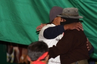 1 de enero del 2015. San Andrés Larrainzar. La delegación de padres de familia y compañeros de los normalistas de Ayotzinapa durante las celebraciones del aniversario zapatista en el Caracol II de Oventik