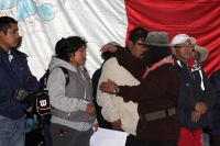1 de enero del 2015. San Andrés Larrainzar. La delegación de padres de familia y compañeros de los normalistas de Ayotzinapa durante las celebraciones del aniversario zapatista en el Caracol II de Oventik