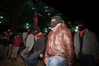 1 de enero del 2015. San Andrés Larrainzar. La delegación de padres de familia y compañeros de los normalistas de Ayotzinapa durante las celebraciones del aniversario zapatista en el Caracol II de Oventik