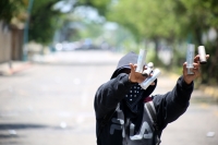20210531. Tuxtla G. Continúan los enfrentamientos entre normalistas y las corporaciones policiacas de Chiapas
