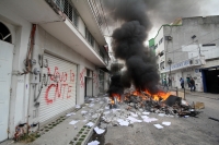 Mayo del 2015. Tuxtla Gutiérrez. Durante la jornada de incendios de edificios de partidos políticos del Movimiento Magisterial.