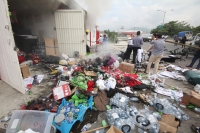 Mayo del 2015. Tuxtla Gutiérrez. Durante la jornada de incendios de edificios de partidos políticos del Movimiento Magisterial.