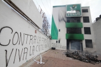 Mayo del 2015. Tuxtla Gutiérrez. Durante la jornada de incendios de edificios de partidos políticos del Movimiento Magisterial.