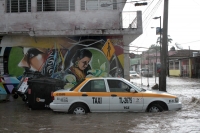 Miércoles 22 de julio del 2020. Tuxtla Gutiérrez. Durante la fuerte lluvia de esta tarde, las calles de la ciudad sufren encharcamientos y hay varios árboles colapsados