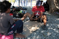 20230627. Tuxtla. Migrantes Venezolanos pernoctan en el Parque del 5 de Mayo.