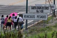 Jueves 31 de octubre del 2013. Chiapa de Corzo. La PFP interviene en la caseta de cobro de la autopista entre San Cristóbal y Tuxtla Gutiérrez, donde un grupo de jóvenes y campesinos mantenÃan tomadas las instalaciones en pugna con el movimiento magisteri Jueves 31 de octubre del 2013. Chiapa de Corzo. La PFP interviene en la caseta de cobro de la autopista entre San Cristóbal y Tuxtla Gutiérrez, donde un grupo de jóvenes y campesinos mantenÃan tomadas las instalaciones en pugna con el movimiento magisteri
