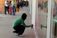 Militantes de la OCEZ marchan en las entradas de la ciudad de San Cristóbal de las Casas y se manifiestan en centros comerciales durante el aniversario de Emiliano Zapata.