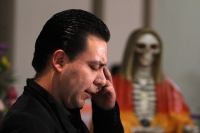 Octubre del 2013. La Santa Muerte Coleta. Los creyentes en el culto de la Santa Muerte se reúnen por un año más en un salón de fiestas del sur de la ciudad coleta para conmemorar la petición de dar a conocer públicamente el credo que desde hace varios año