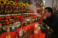 Octubre del 2013. La Santa Muerte Coleta. Los creyentes en el culto de la Santa Muerte se reúnen por un año más en un salón de fiestas del sur de la ciudad coleta para conmemorar la petición de dar a conocer públicamente el credo que desde hace varios año