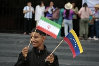 20261007. Tuxtla Estudiantes realizan una cadena humana bajo la lluvia para conmemorar el 7 de octubre del 2023 en Gaza.